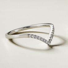 Load image into Gallery viewer, Retro-inspired 18K white gold chevron-shaped band, handcrafted in Montreal by Ex Aurum, featuring approximately 0.10tcw with 15 round brilliant diamonds in a pavé setting.
