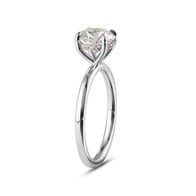 Load image into Gallery viewer, Elegant solitaire in 18K white gold, featuring a round brilliant laboratory diamond in an eagle claw setting, surrounded by a hidden halo of 16 small diamonds totaling 0.08tcw, blending classic and contemporary styles.
