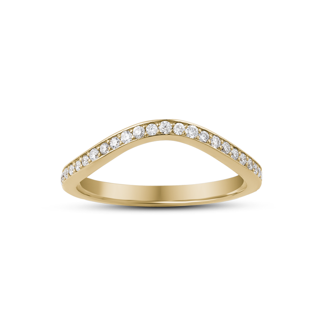 Elegant curved 14K yellow gold band, weighing approximately 2.10gr, adorned with fine pavé diamonds along the top curve, designed to complement solitaire engagement rings with a soft, contouring fit.