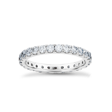 Load image into Gallery viewer, Elegant full eternity band in 18K white gold, featuring 1.35tcw of round brilliant diamonds evenly spaced around the band, symbolizing endless love and partnership.

