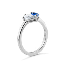 Load image into Gallery viewer, Elegant two stone ring in 14K white gold, featuring a 0.56ct Chatham sapphire and a 0.45ct lab diamond pear shape, VS/F, in a 3-prong setting, handcrafted in Montreal by Ex Aurum.
