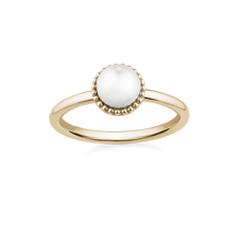 Load image into Gallery viewer, Elegant pearl promise ring in 14K yellow gold, featuring a 6-6.5mm round white pearl set in a textured milgrain frame, symbolizing tradition and history, handcrafted by Ex Aurum in Montreal.
