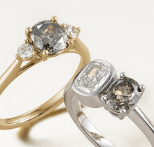 Load image into Gallery viewer, Unique engagement ring in 18K white gold, featuring a 0.73pt salt &amp; pepper oval diamond alongside a 62pt cushion lab diamond, combining delicacy with strength for a balanced and ethereal appearance.
