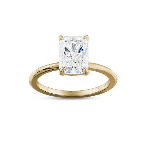 Solitaire in 18K white gold, featuring a 2.04ct radiant cut diamond in an eagle claw setting, embodying contemporary elegance with its simple yet striking design, handcrafted by Ex Aurum in Montreal.