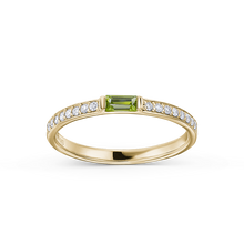 Load image into Gallery viewer, Elegant 14K yellow gold ring with a dynamic character, featuring a peridot baguette and 0.13ctw of diamonds in a combined pavé and bar setting.
