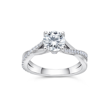 Load image into Gallery viewer, 18K white gold ring featuring a 1ct round brilliant center diamond with 0.27tcw of smaller pavé set diamonds in an asymmetrical, sweeping design, symbolizing a serene and continuous motion.
