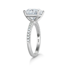 Load image into Gallery viewer, Exquisite engagement ring in 18K white gold, featuring a 3.18ct cushion cut diamond in a four-claw setting, complemented by 0.23tcw of small pavé set diamonds on the band, crafted to harmonize with various band styles.
