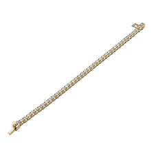 Load image into Gallery viewer, Stunning 18K yellow gold bracelet shimmering with 4.40tcw diamonds in a four-prong setting, featuring geometric patterns for brilliance and comfort, secured with a box clasp and slip-lever lock.
