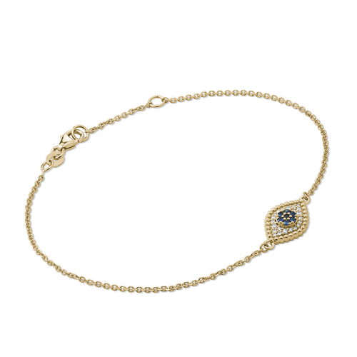 Stunning bracelet in 18K yellow gold, handcrafted by Ex Aurum in Montreal, combines the protective symbolism of the evil eye with the luxury of precious metals and gemstones. It features 0.10ct of sapphires and 0.11ctw of diamonds, with an adjustable length of 7 inches, and an option for personalized engraving on the polished reverse side.