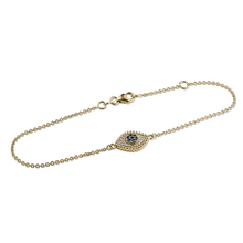 Load image into Gallery viewer, Stunning bracelet in 18K yellow gold, handcrafted by Ex Aurum in Montreal, combines the protective symbolism of the evil eye with the luxury of precious metals and gemstones. It features 0.10ct of sapphires and 0.11ctw of diamonds, with an adjustable length of 7 inches, and an option for personalized engraving on the polished reverse side.
