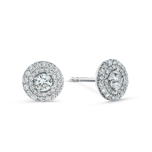 Stylish stud earrings in 18K white gold, each with a 9mm disc featuring a double row of pavé diamonds totaling approximately 0.76ctw, centered with claw-set diamonds for a dimensional and voluminous look.