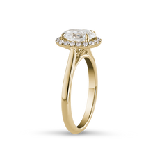Load image into Gallery viewer, Elegant 18K yellow gold ring featuring a 1.02ct round brilliant diamond with a pavé halo and a cathedral shoulder design, offering a glowing and dimensional appearance, complemented by 0.18tcw of smaller pavé set diamonds.
