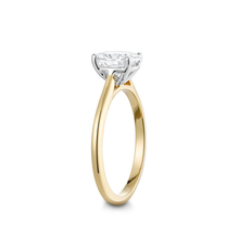 Load image into Gallery viewer, Elegant engagement ring in 18K yellow gold with a white gold setting, featuring a 1ct oval diamond in a four claw setting, designed to elongate the hand.
