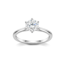 Load image into Gallery viewer, Elegant 18K white gold solitaire engagement ring featuring a 1ct round brilliant diamond in a six-claw setting, symbolizing harmony and stability, handcrafted by Ex Aurum in Montreal.
