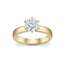 Load image into Gallery viewer, Stunning solitaire engagement ring in 18K yellow gold, weighing approximately 4.75gr, featuring a dazzling 1.06ct round brilliant diamond in a six claw setting on a wide tapering band.
