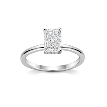 Load image into Gallery viewer, Stunning engagement ring in 18K white gold, featuring a 2ct radiant cut diamond, held high above a slim 1.8mm band with a hidden halo of small pavé diamonds.
