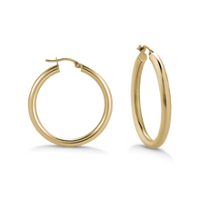 Load image into Gallery viewer, Classic Italian 18K yellow gold hoop earrings, 31mm in diameter with 3mm round tubes, featuring a curved tension post for secure wear, combining all-day comfort with a glossy, impactful look.
