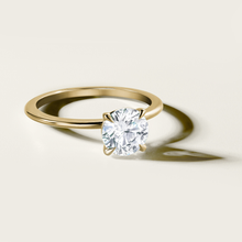 Load image into Gallery viewer, Delicate &#39;Fine Spirit&#39; solitaire engagement ring in 14K yellow gold, featuring a 1.01ct lab diamond on a slim 1.6mm band with a reverse taper and finely pointed claws, embodying minimalist elegance.
