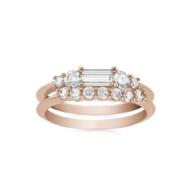 Load image into Gallery viewer, Elegant set in 18K rose gold, featuring a 0.33ct diamond baguette centerpiece with 0.78tcw of small diamonds in claw settings, accented by low knife-edged bands with stepped levels for a dynamic look.
