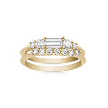 Load image into Gallery viewer, Elegant &#39;Delight Pair&#39; set in 18K yellow gold, featuring a 0.33ct diamond baguette centerpiece with 0.78tcw of small diamonds in claw settings, accented by low knife-edged bands with stepped levels for a dynamic look.
