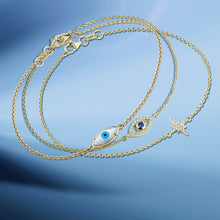 Load image into Gallery viewer, Double Eye bracelet featured stacked with other elegant bracelets.
