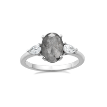Load image into Gallery viewer,  This unique engagement ring combines traditional and modern elements, featuring a 1.59ct oval salt &amp; pepper diamond from the grey diamond family. It&#39;s accented by two pear-shaped diamonds totaling 0.32ct each, set in 18K white gold.
