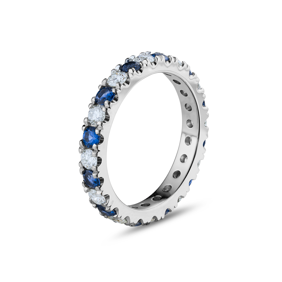 Full eternity ring in 18K white gold, beautifully set with round cut diamonds and sapphires, showcasing the vivid colors and brilliance of the gemstones, crafted with precision by Ex Aurum in Montreal.