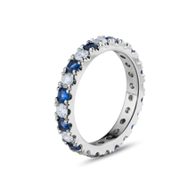 Charger l&#39;image dans la galerie, Full eternity ring in 18K white gold, beautifully set with round cut diamonds and sapphires, showcasing the vivid colors and brilliance of the gemstones, crafted with precision by Ex Aurum in Montreal.
