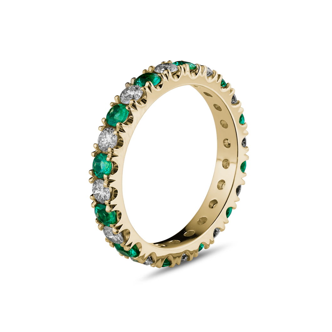 18K yellow gold ring featuring a seamless blend of 0.65tcw round cut emeralds and 0.72tcw diamonds in prong settings
