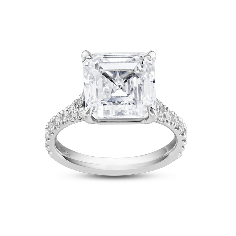 Exquisite platinum engagement ring featuring a 5ct Asscher cut lab diamond, VS1/F, in an eagle claw setting, with a split band and cathedral style silhouette, adorned with 0.39tcw of small round brilliant diamonds pavé set along the band, offering classic styling with Deco glamour.