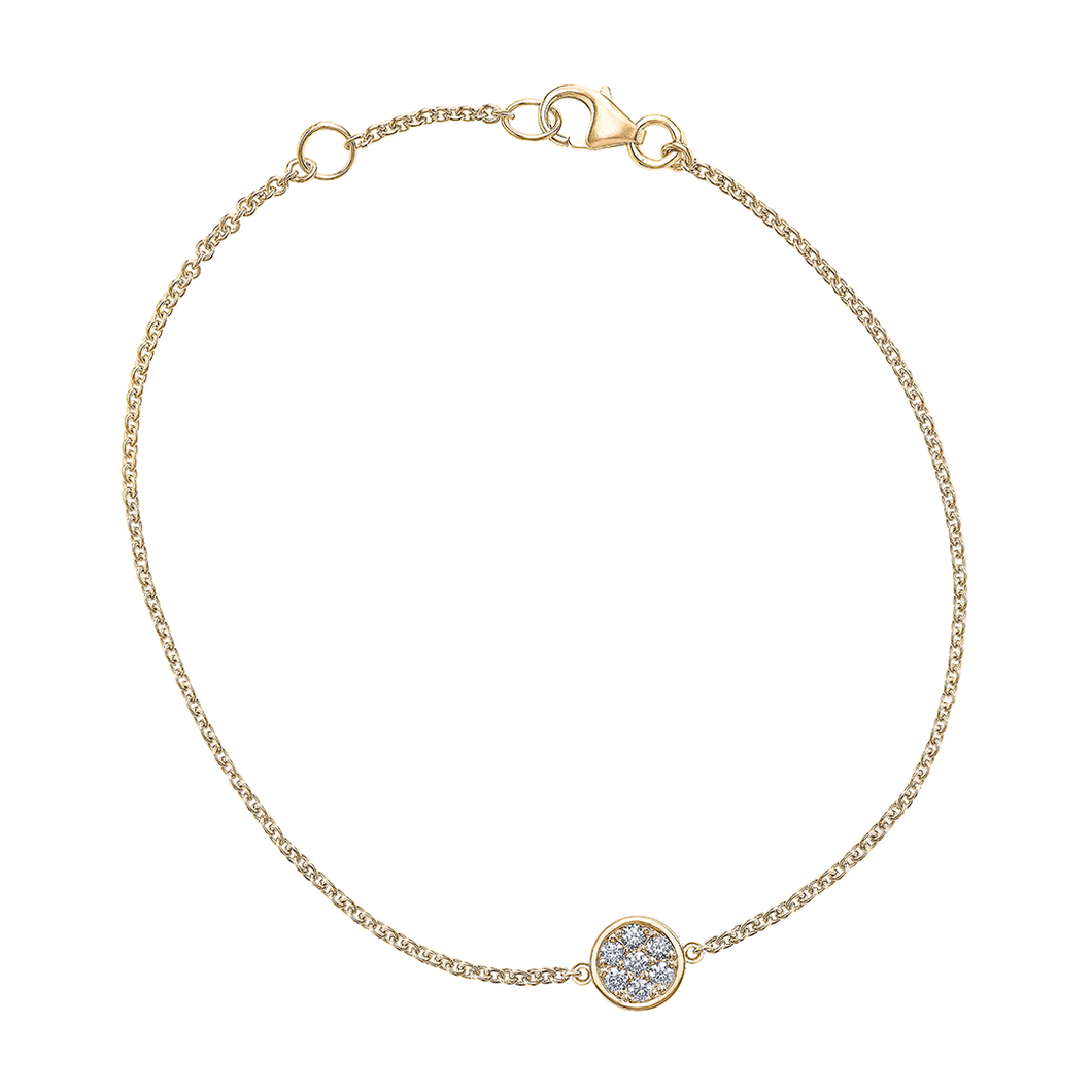 Charming bracelet in 18K yellow gold, adorned with seven twinkling diamonds totaling approximately 0.07tcw, capturing the essence of a full moon's glow and mystery, 7 inches in length with an adjustable station.