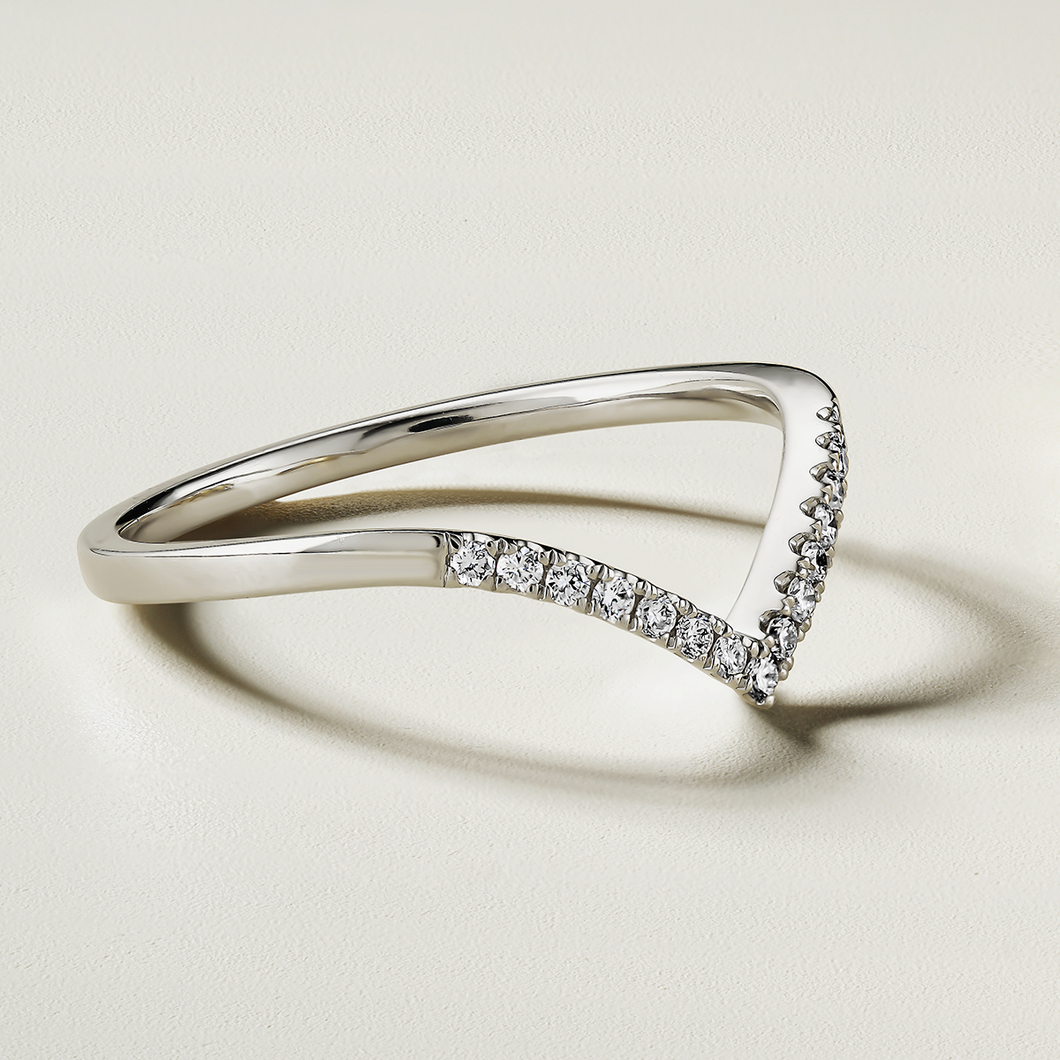 Retro-inspired 18K white gold chevron-shaped band, handcrafted in Montreal by Ex Aurum, featuring approximately 0.10tcw with 15 round brilliant diamonds in a pavé setting.