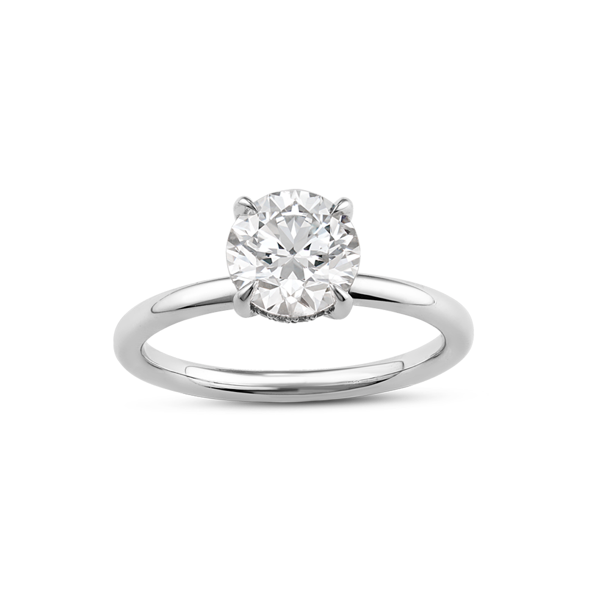 Elegant solitaire in 18K white gold, featuring a round brilliant laboratory diamond in an eagle claw setting, surrounded by a hidden halo of 16 small diamonds totaling 0.08tcw, blending classic and contemporary styles.