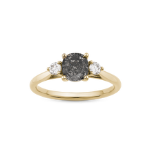 Load image into Gallery viewer, Elegant engagement ring in 18K yellow gold, featuring a 0.94ct oval salt &amp; pepper diamond, flanked by two round brilliant diamonds totaling 0.15tcw, combining tradition with a luxurious warm appeal.
