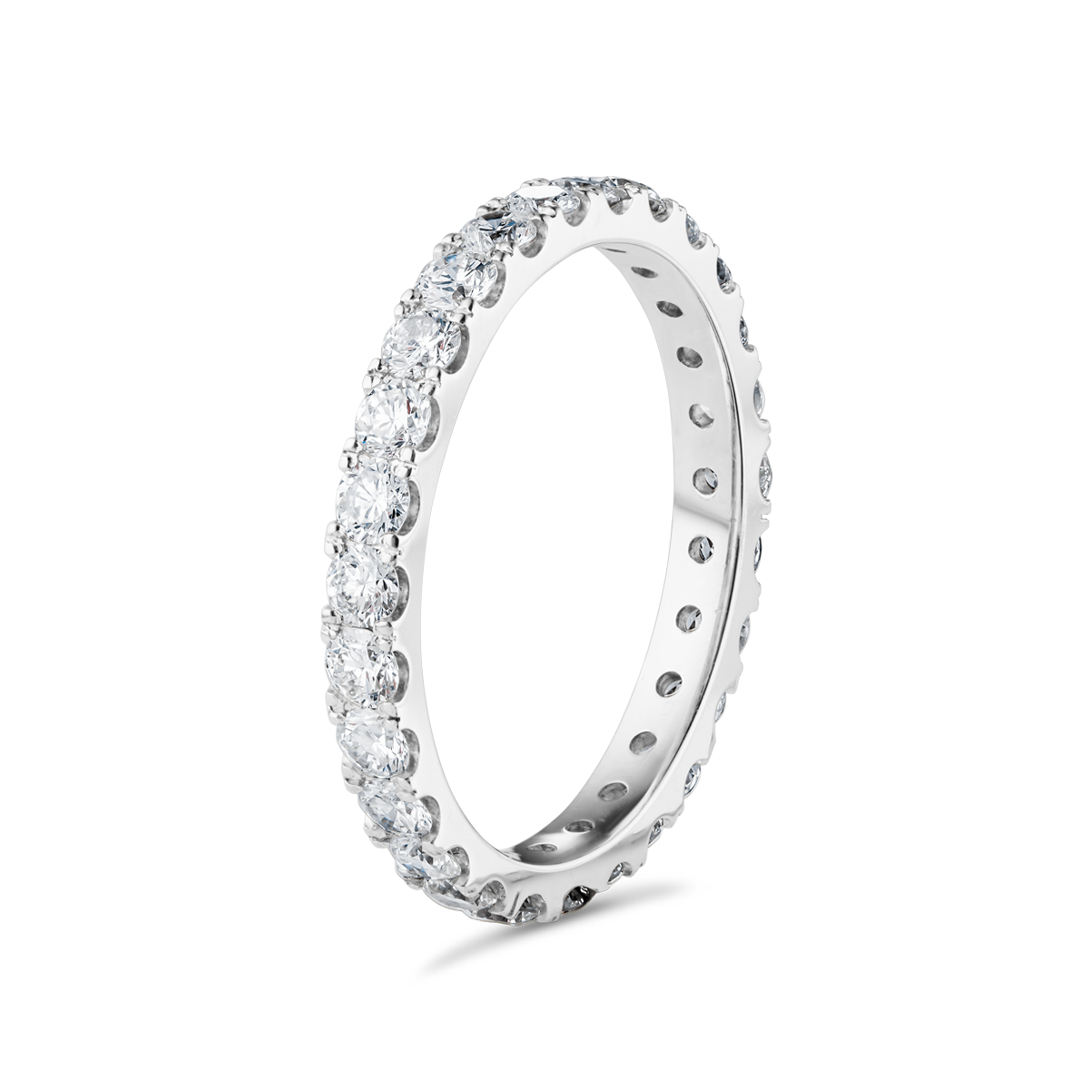 Elegant full eternity band in 18K white gold, featuring 1.35tcw of round brilliant diamonds evenly spaced around the band, symbolizing endless love and partnership.