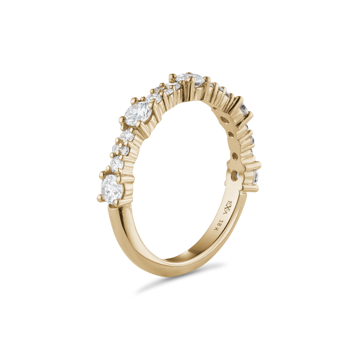 Elegant 18K yellow gold band featuring 21 round brilliant diamonds totaling approximately 0.75tcw in a fine prong setting, adorning the top half of the band.