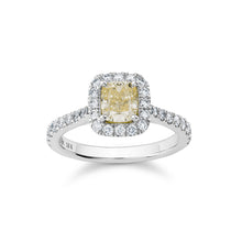Charger l&#39;image dans la galerie, Luxurious ring in 18K white gold, featuring a 0.98ct fancy yellow diamond centerpiece surrounded by a halo and 34 diamonds totaling 0.48tcw, creating a dazzling display of brilliance and color.

