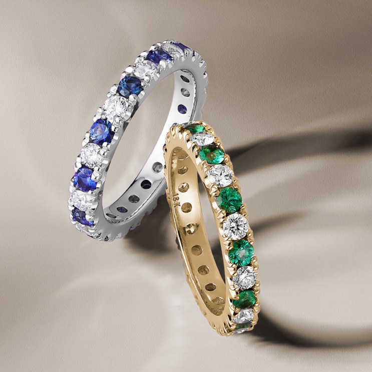 Full eternity ring in 18K white gold, beautifully set with round cut diamonds and sapphires, showcasing the vivid colors and brilliance of the gemstones, crafted with precision by Ex Aurum in Montreal.