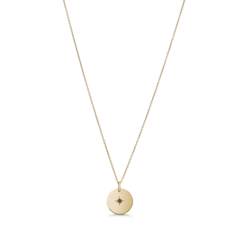 Unique double-sided 14K yellow gold pendant, featuring a script-styled initial on one side and a gemstone set in a diamond-cut star pattern on the reverse, measuring 15mm in diameter, accompanied by an 18" adjustable chain.