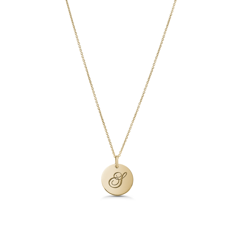 Unique double-sided 14K yellow gold pendant, featuring a script-styled initial on one side and a gemstone set in a diamond-cut star pattern on the reverse, measuring 15mm in diameter, accompanied by an 18" adjustable chain.