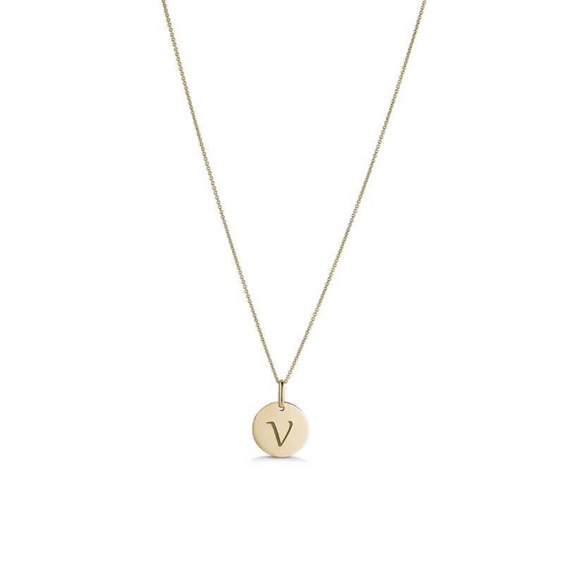 Elegant necklace in 14K yellow gold, featuring a 13mm engraved disc with the option to choose an initial, complemented by a seamless integrated loop bail, on a 16" 1.2mm cable chain, exemplifying Italian craftsmanship.