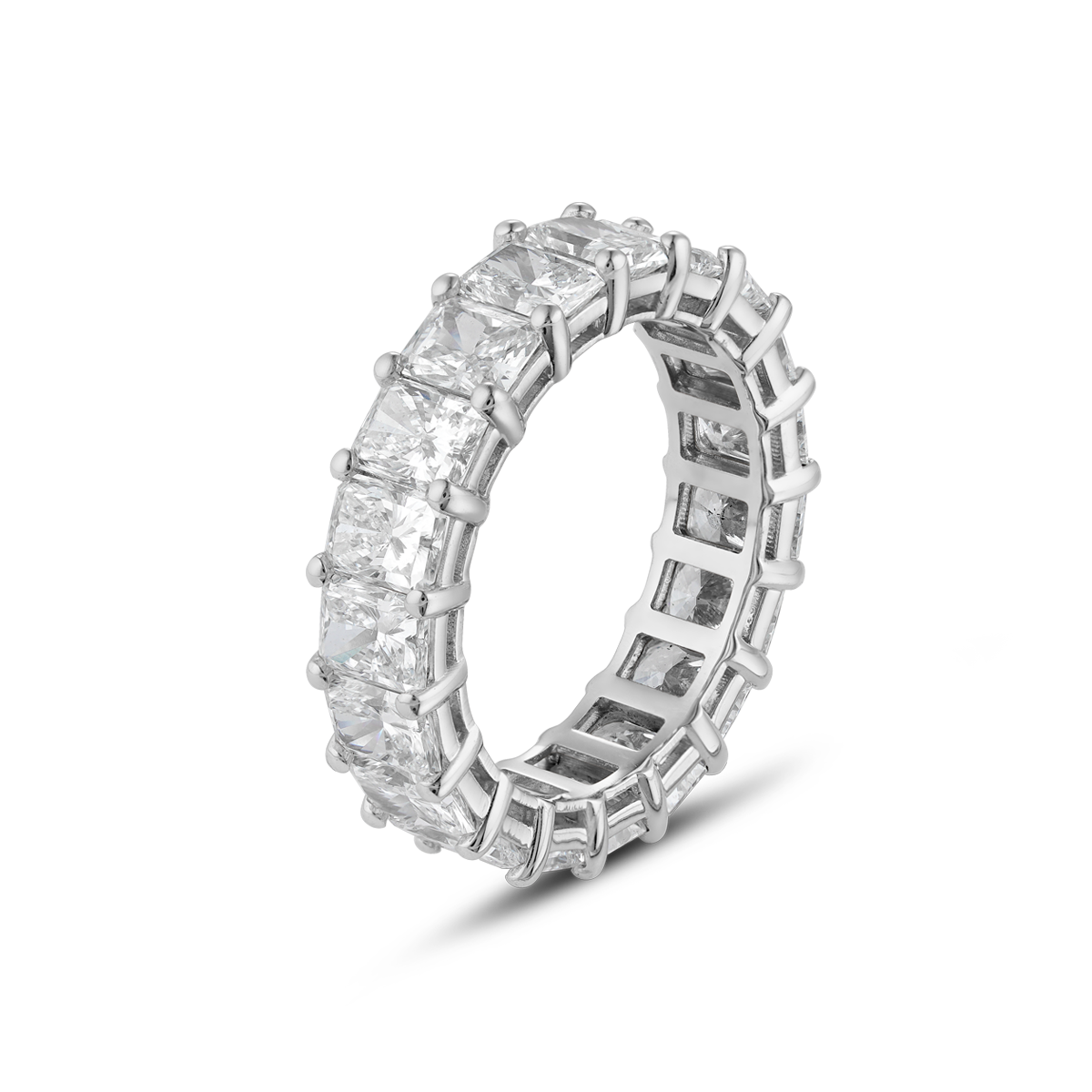 Luxurious 18K white gold band featuring 5.82 carats of end-to-end radiant cut VS/E-F lab-grown diamonds, set in fine prongs with a total of 19 diamonds. The band showcases a geometric echo pattern inside, reminiscent of intricate scaffolding, emphasizing strength and vitality.