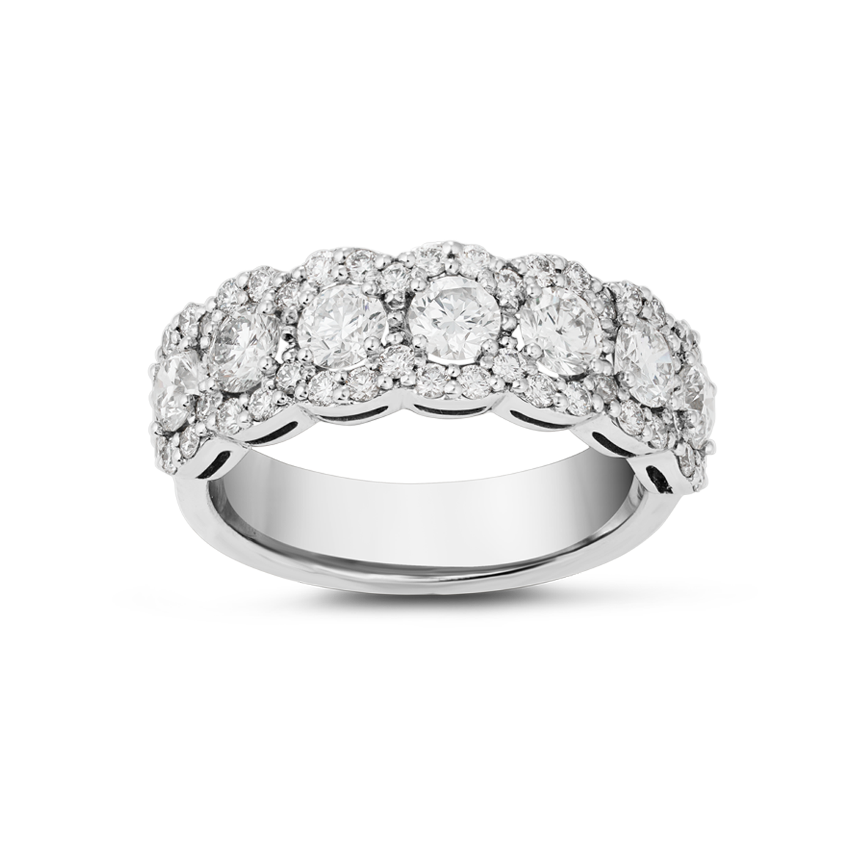 Exquisite ring in 18K white gold, handcrafted in Montreal by Ex Aurum, featuring seven feature diamonds surrounded by a continuous scalloped halo, with a total of approximately 53 diamonds and weighing about 5gr, showcasing a gleaming and elegant design.