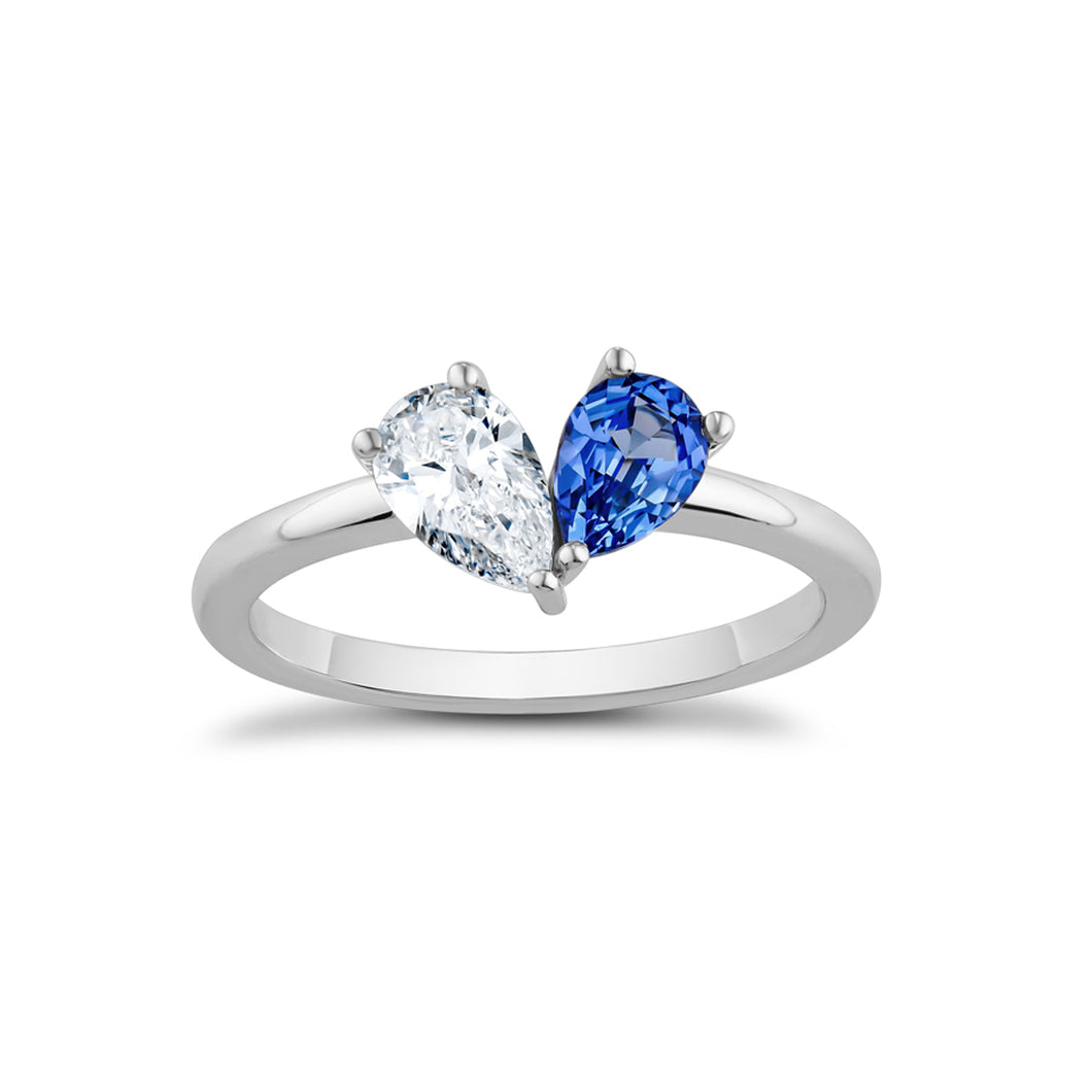 Elegant two stone ring in 14K white gold, featuring a 0.56ct Chatham sapphire and a 0.45ct lab diamond pear shape, VS/F, in a 3-prong setting, handcrafted in Montreal by Ex Aurum.