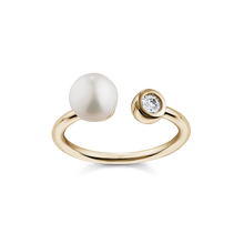Load image into Gallery viewer, Elegant ring in 14K yellow gold, handcrafted by Ex Aurum in Montreal, featuring a 6.5-6.75mm round white pearl and a 0.09ct round brilliant diamond in a bezel setting, symbolizing purity and unity.
