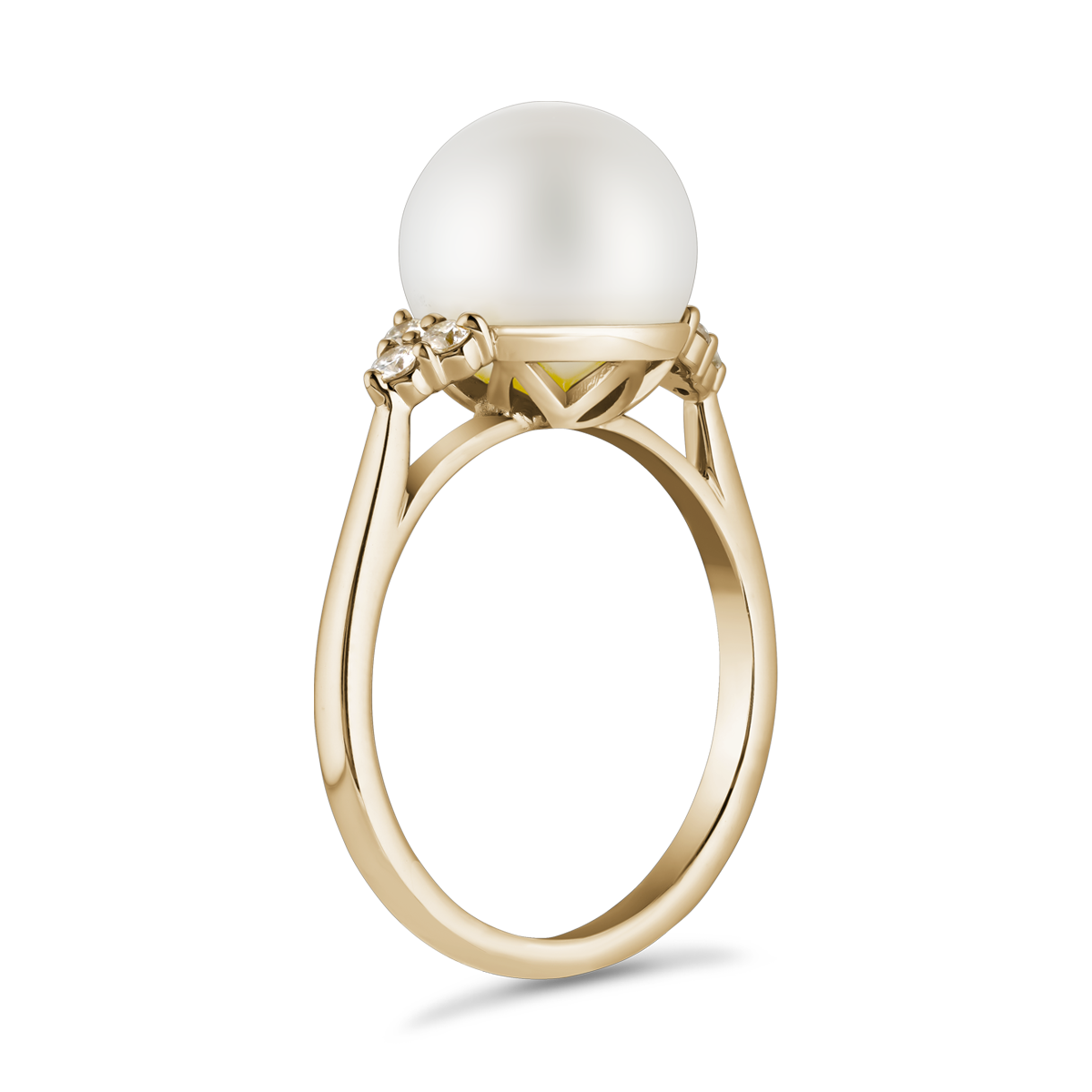 Sophisticated cathedral-style ring in 18K yellow gold, featuring a large South Sea pearl (9-9.5mm) framed by six diamonds totaling 0.15tcw, embodying timeless beauty, handcrafted by Ex Aurum in Montreal.