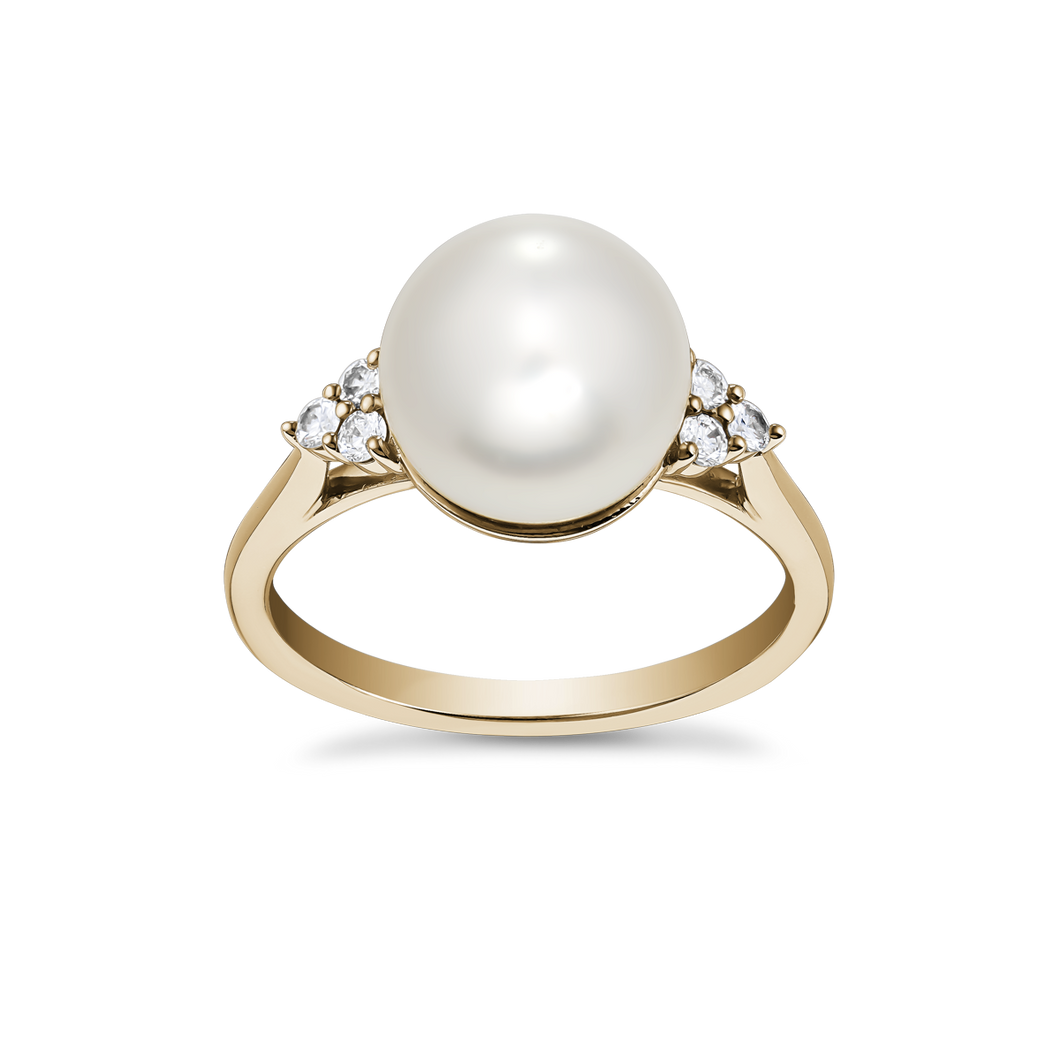 Sophisticated cathedral-style ring in 18K yellow gold, featuring a large South Sea pearl (9-9.5mm) framed by six diamonds totaling 0.15tcw, embodying timeless beauty, handcrafted by Ex Aurum in Montreal.