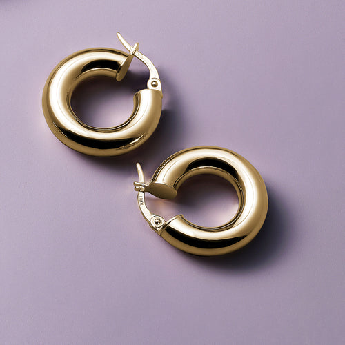 Timeless 10K yellow gold hoop earrings, 20mm in diameter with a 5mm tube width, combining elegance and sophistication, perfect for enhancing any outfit and adding a touch of everyday luxury.
