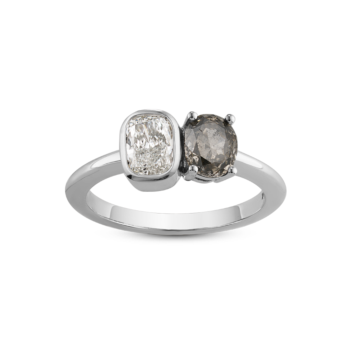 Unique engagement ring in 18K white gold, featuring a 0.73pt salt & pepper oval diamond alongside a 62pt cushion lab diamond, combining delicacy with strength for a balanced and ethereal appearance.