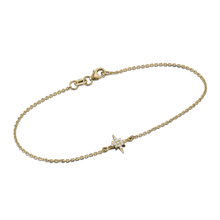 Load image into Gallery viewer, Elegant bracelet in 18K yellow gold, featuring a 7x7mm star-shaped motif with pavé-set diamonds totaling 0.06tcw, on a 6.75&quot; chain with a lobster clasp, symbolizing dawn&#39;s grace.
